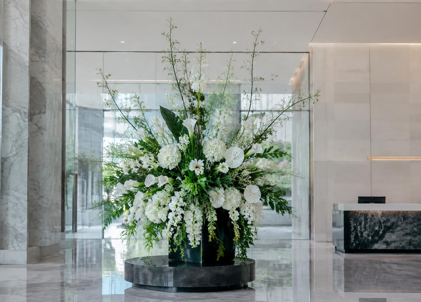 The Corporate Statement — White hydrangea, calla, anthurium, delphinium
