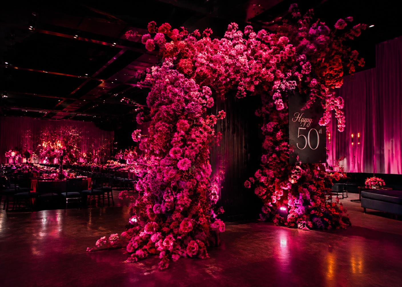 In Full Bloom — Fuchsia roses, magenta carnation, cascading blooms